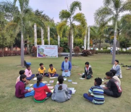 student_sitting_in_garden